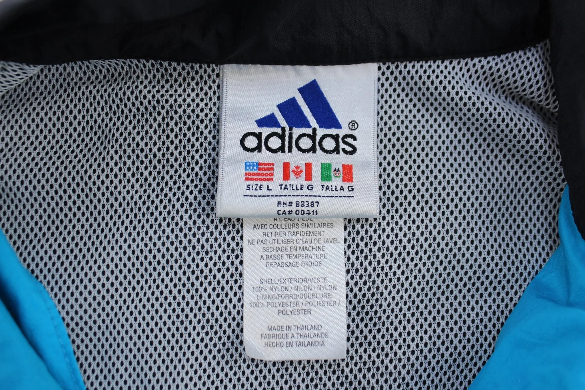 Women's 90's Adidas Embroidered Logo Blue, Black, & White Striped Jacket - Image 4