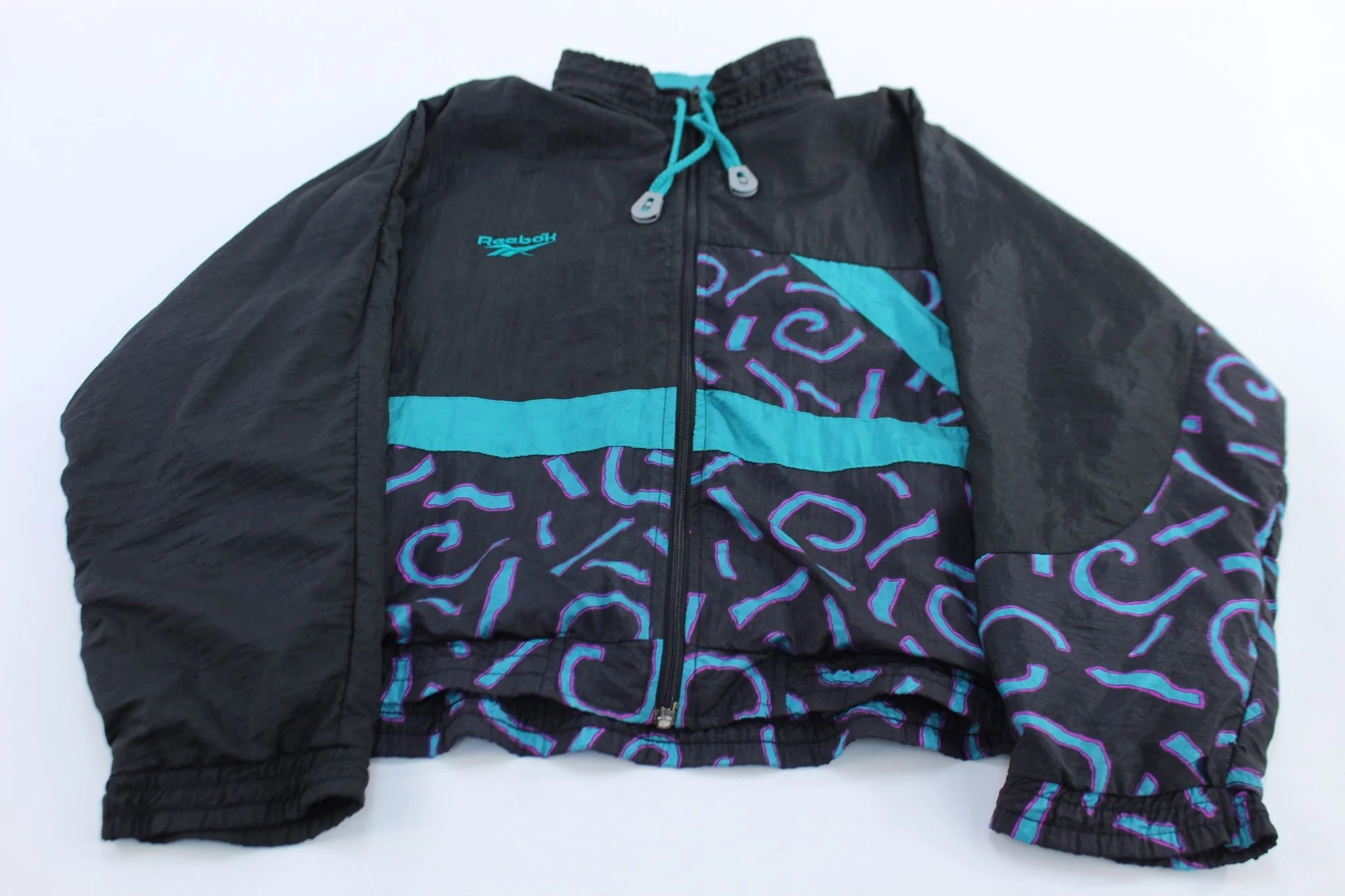 Women's 90's Reebok Embroidered Logo Abstract Windbreaker Jacket