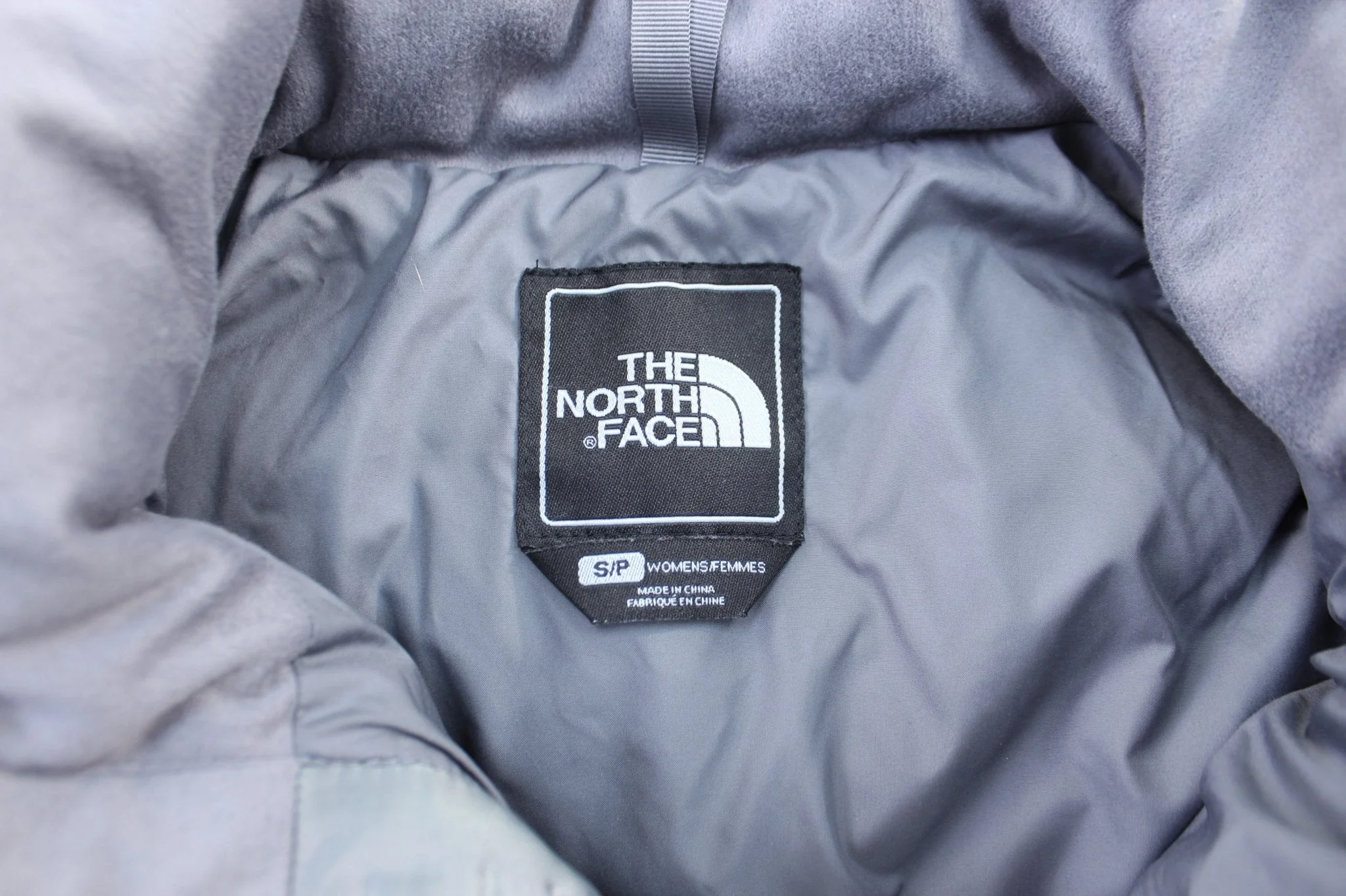 Women's The North Face 550 Grey & White Reverisble Puffer Vest - Image 5